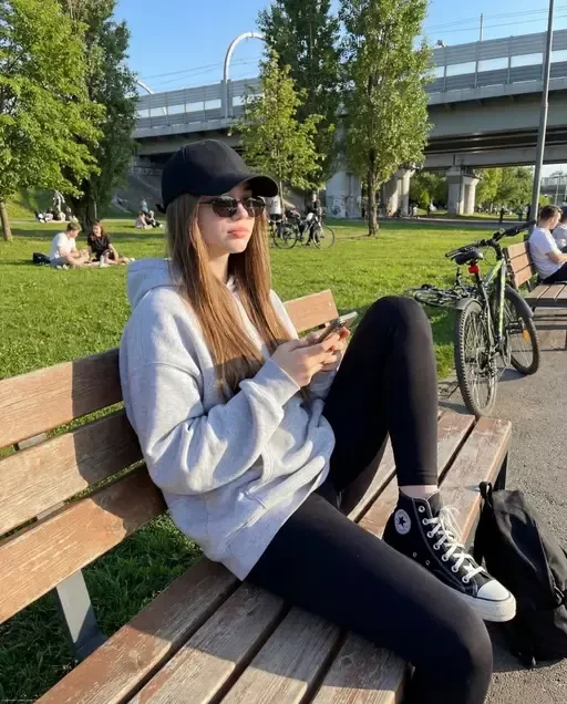 Young Woman on Park Bench Lifestyle