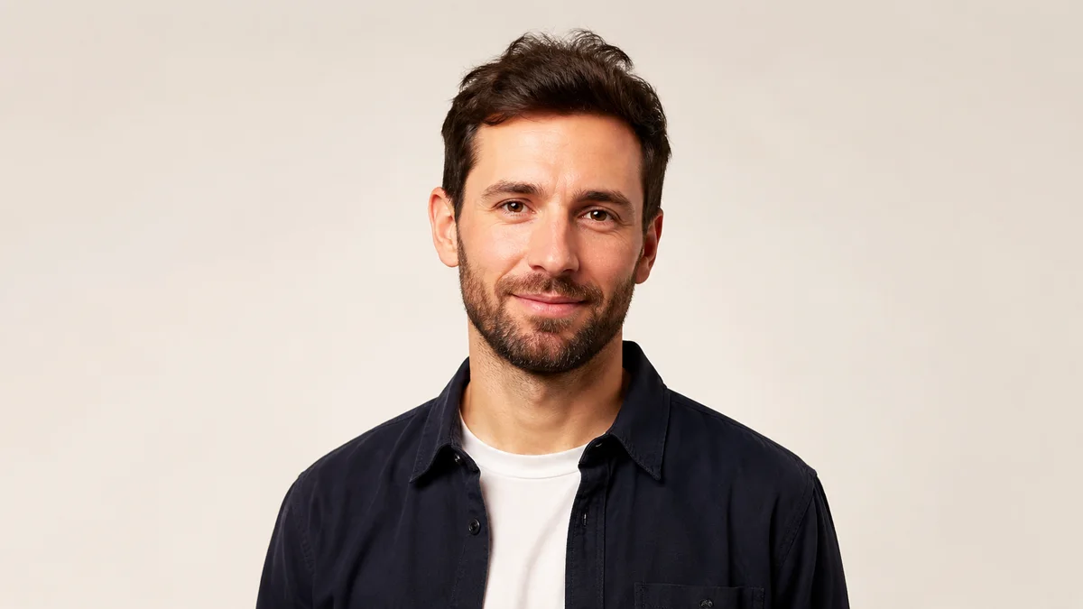 Consistent company team portrait on a warm off-white background